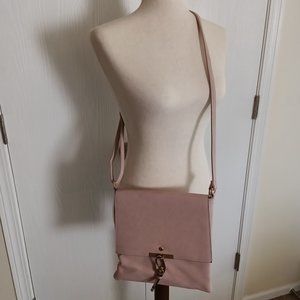 Blush colored adjustable crossbody purse